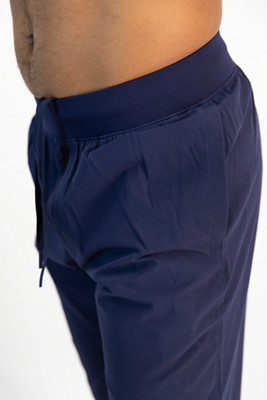 Le pantalon extensible UA Woven