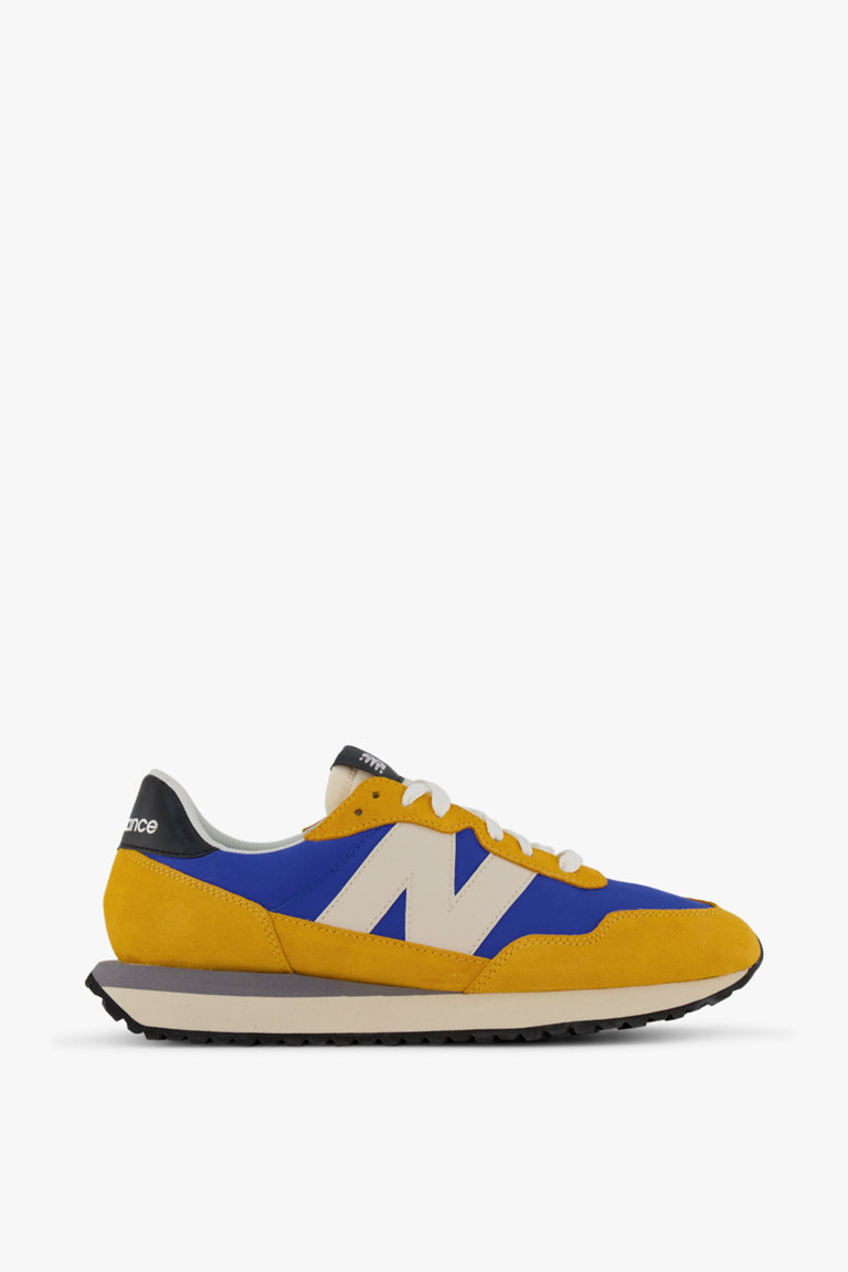 new balance uomo oro